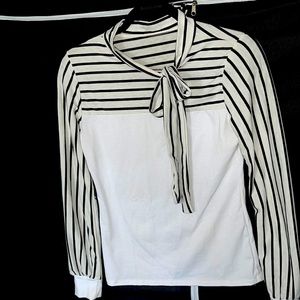 White long sleeve cotton top, with black stripes at top and neck bow.